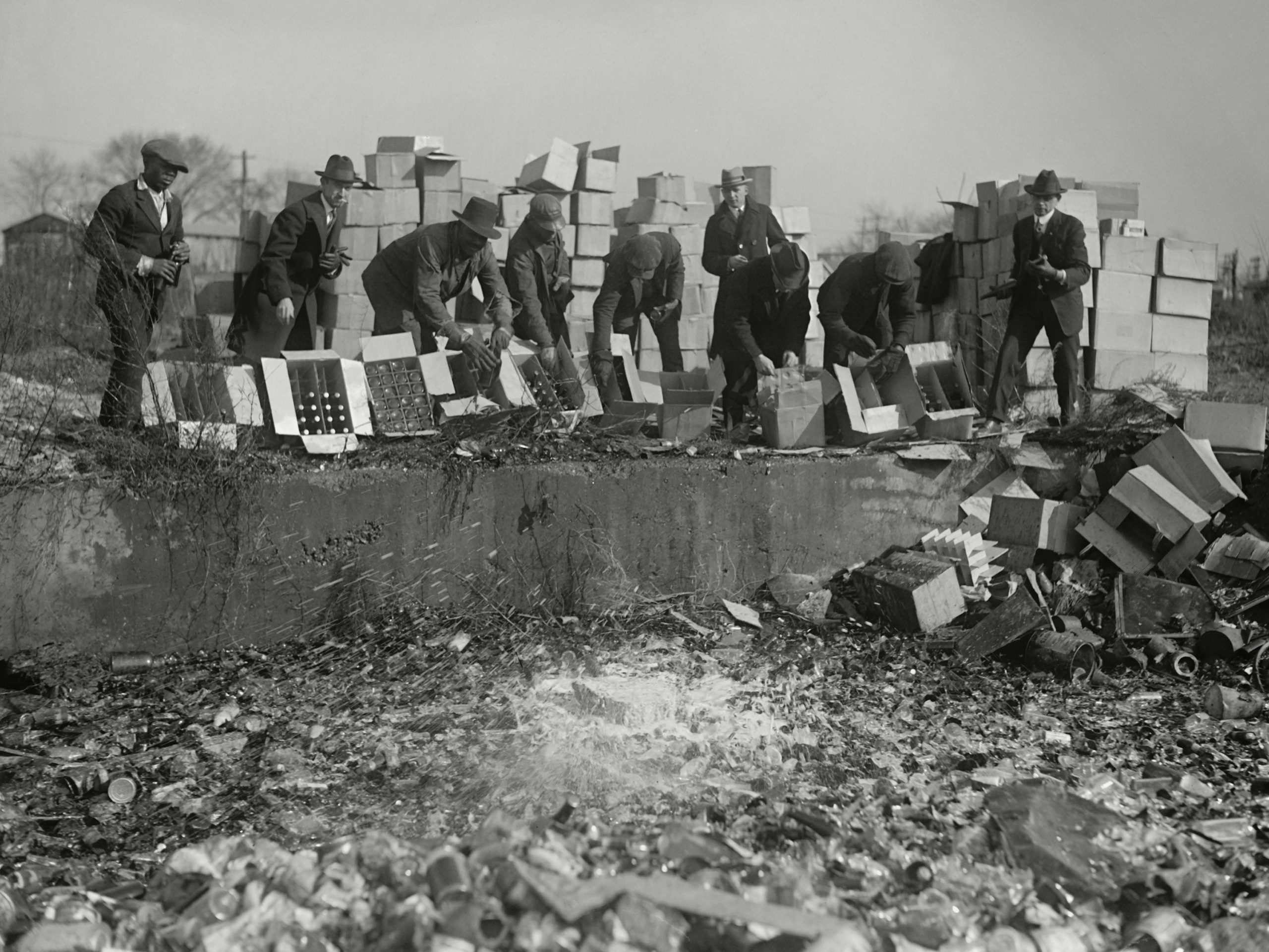 Mandatory Credit: Photo by Everett/Shutterstock (10112301a) Government agents destroying whiskey and beer during Prohibition. Washington, DC area, Nov. 20, 1923