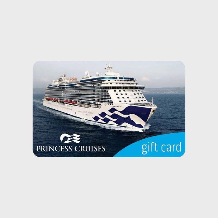 Cruise ship sails in open sea; white waves on the hull. Text reads 