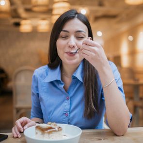 A young women enjoying her desert