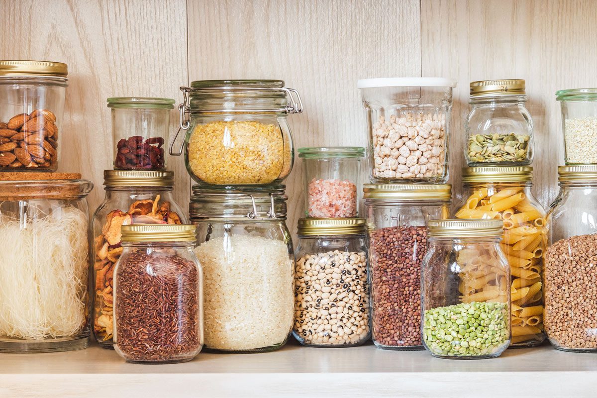 Shelf In The Kitchen With Various Cereals And Seeds