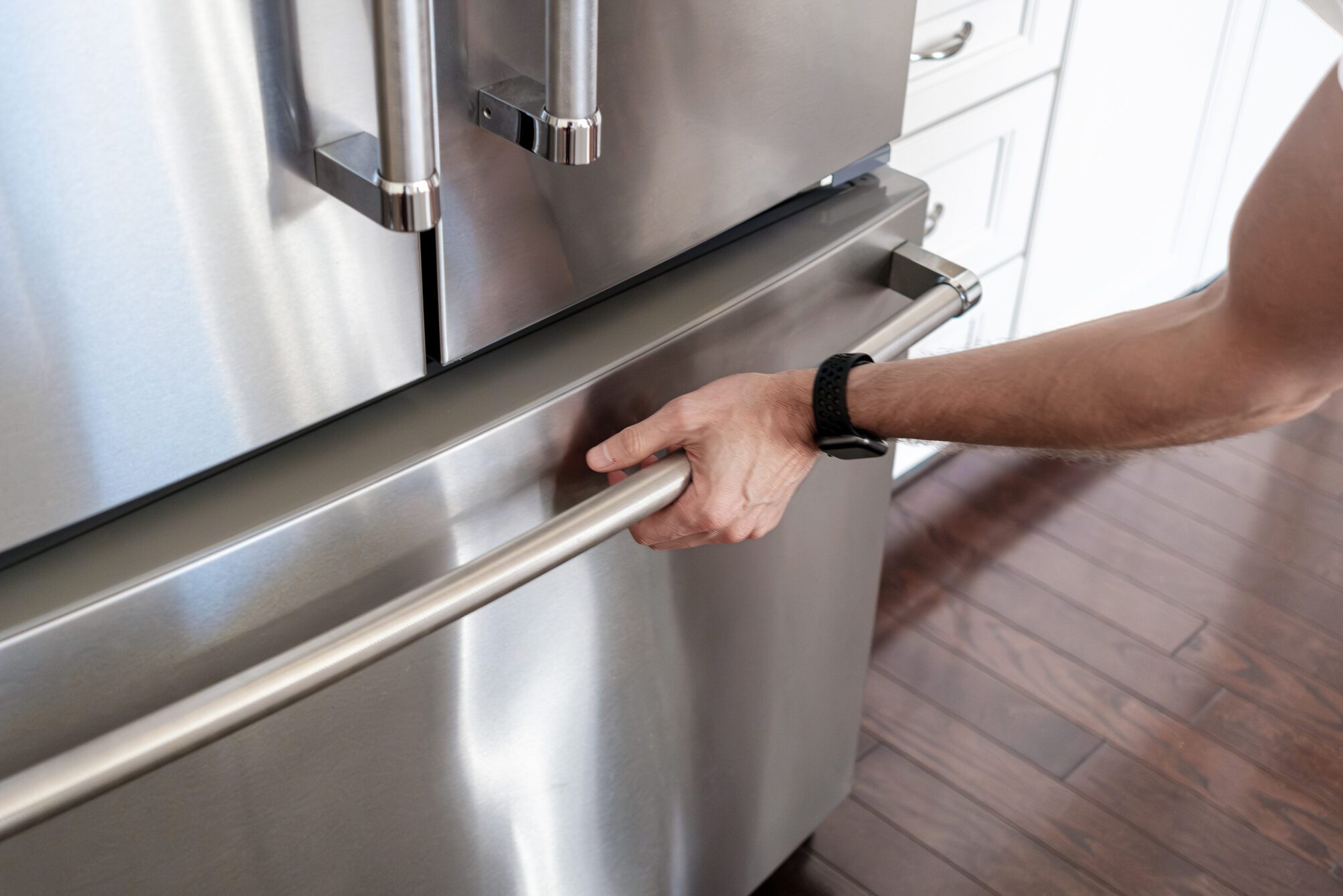 Man Opens Freezer Door