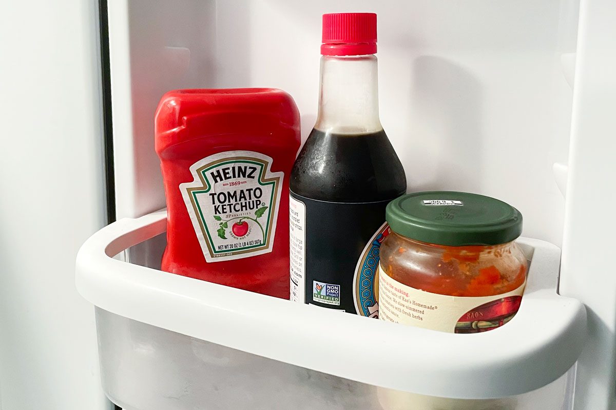 Ketchup and other condiments in a refrigerator door