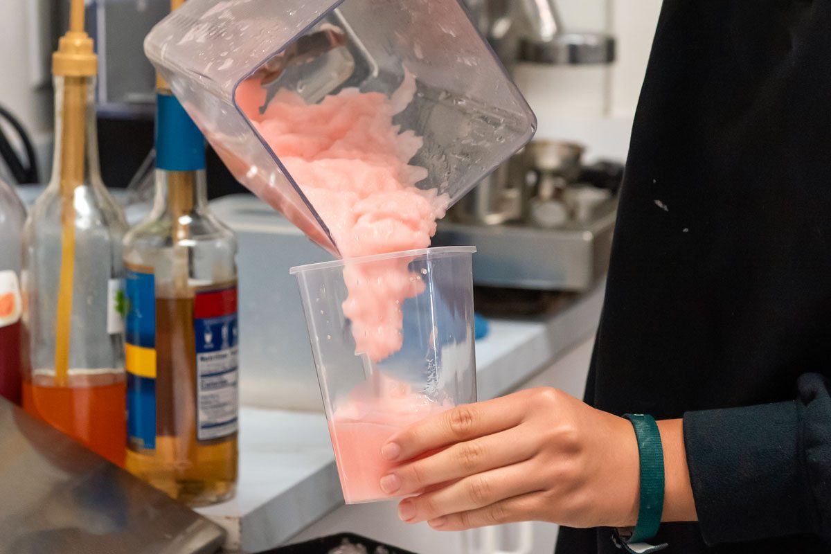 Pouring Frozen Drink In Glass