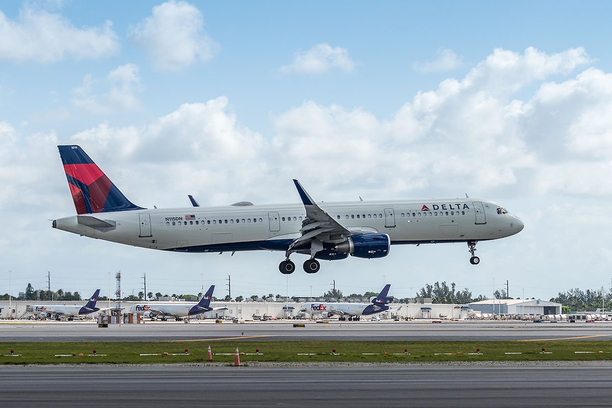 Delta Airlines airplane (Boeing 737-832) landing at by Miami International airport.